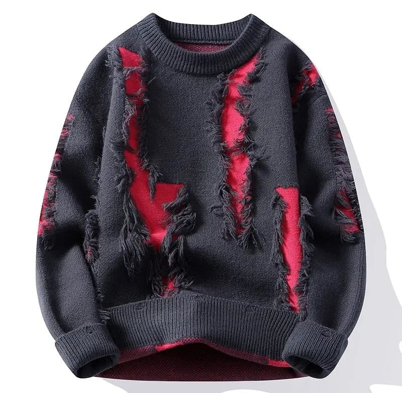 Riven distressed navy knit crewneck sweater with frayed red panels and layered textured panels