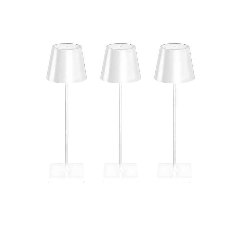 Three white cordless table lamps with conical shades on slim stems and square bases against a white background.