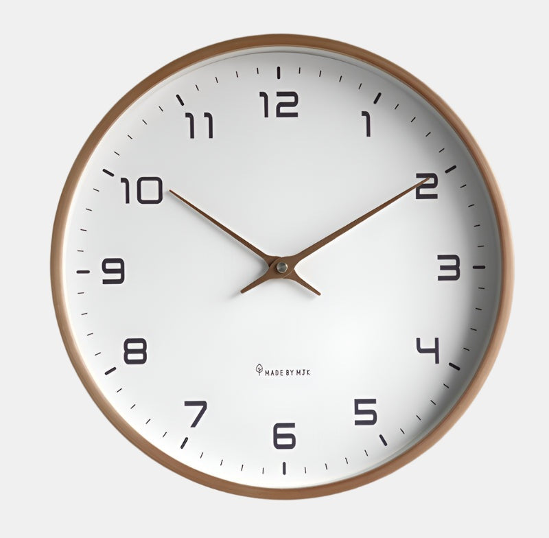 Round wall clock with copper frame, white dial, black numerals, and copper hands.