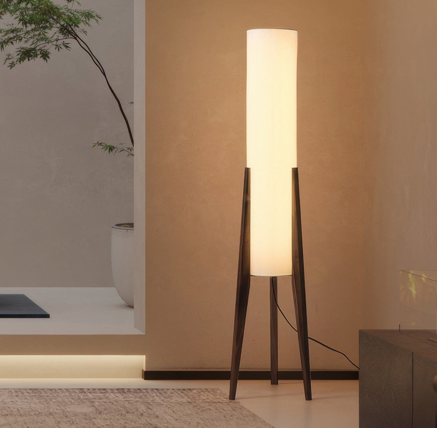 Kiyora Japandi floor lamp with solid walnut wood tripod legs and a tall white fabric shade
