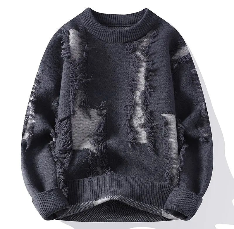 Distressed navy crewneck sweater with frayed patches and layered textured panels, ribbed cuffs and hem, long sleeves