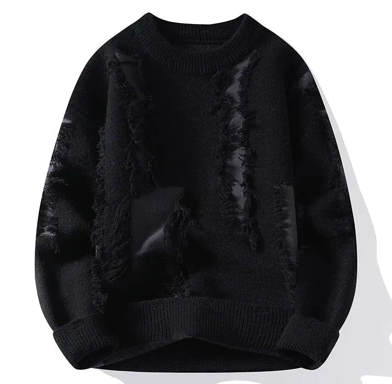 black distressed crewneck sweater with frayed detailing and layered textured panels