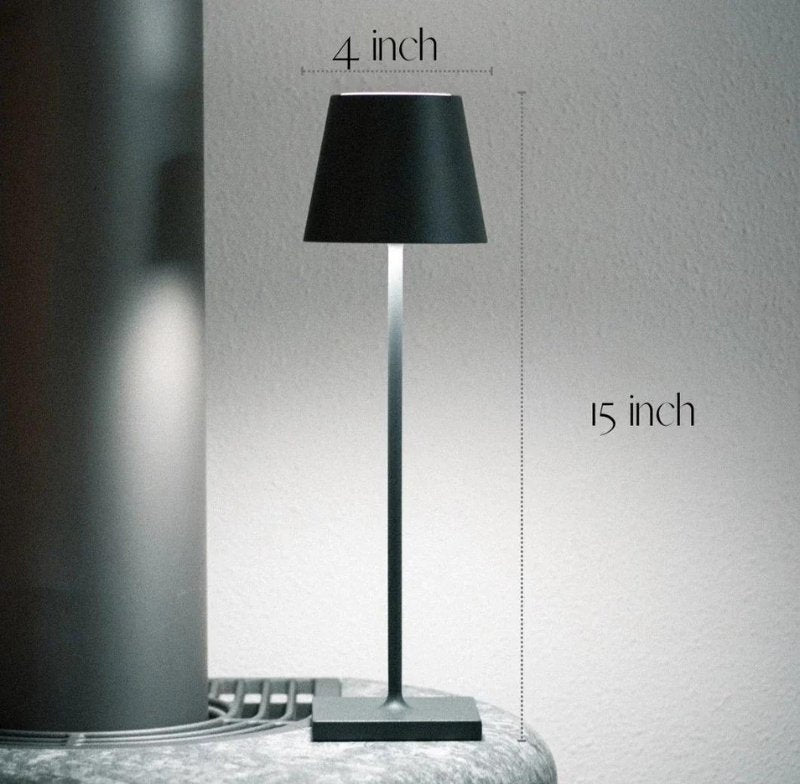 Solaris cordless table lamp with powder coated aluminium finish and touch dimming, featuring a black lampshade atop a slim metal stem and square base